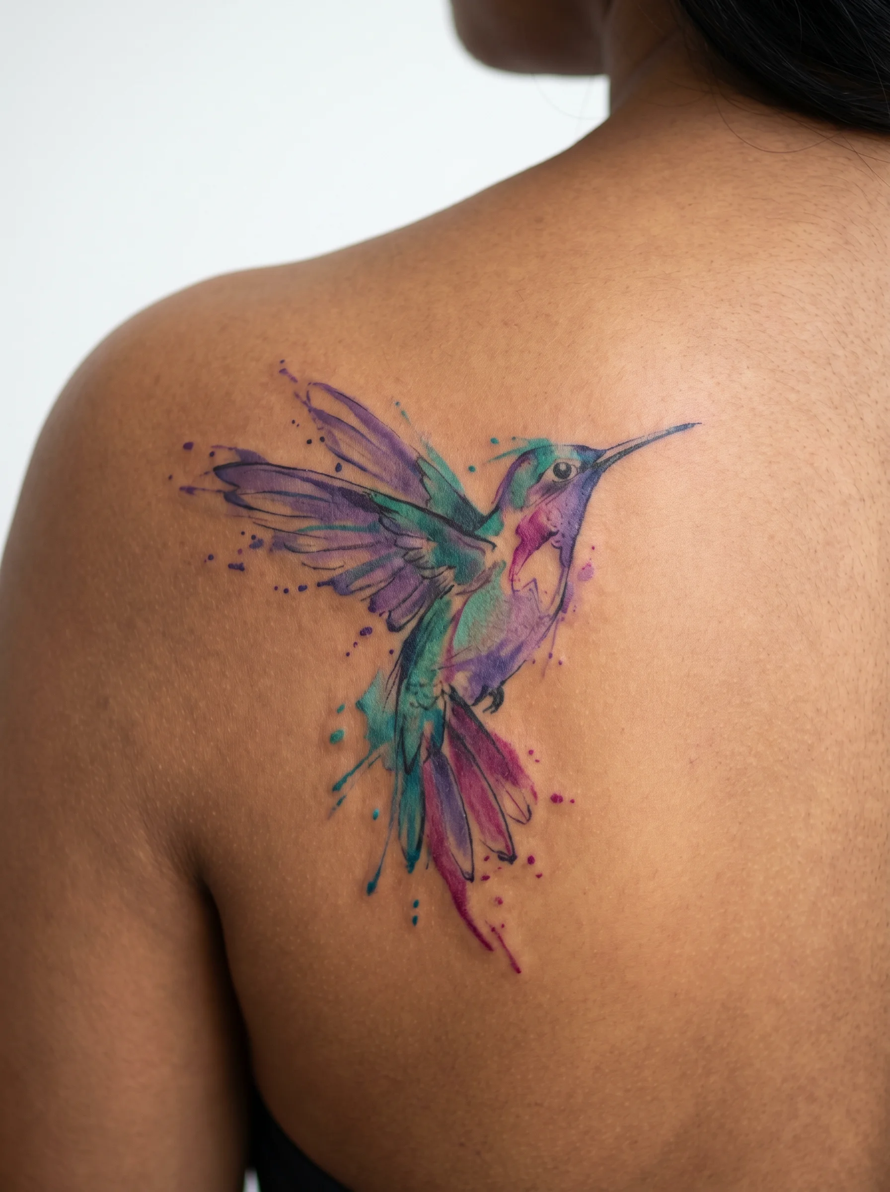 Watercolor shoulder tattoo